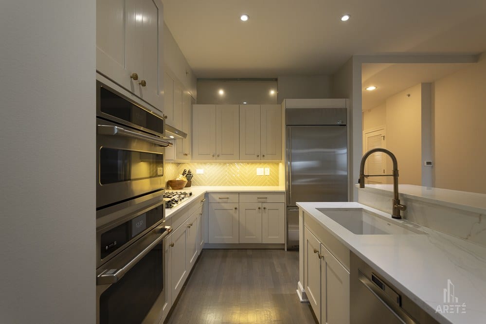 Chicago Loop Condo Kitchen Renovation - White Shaker Cabinets an - Arete' Chicago Loop Condo Kitchen Renovation - White Shaker Cabinets an