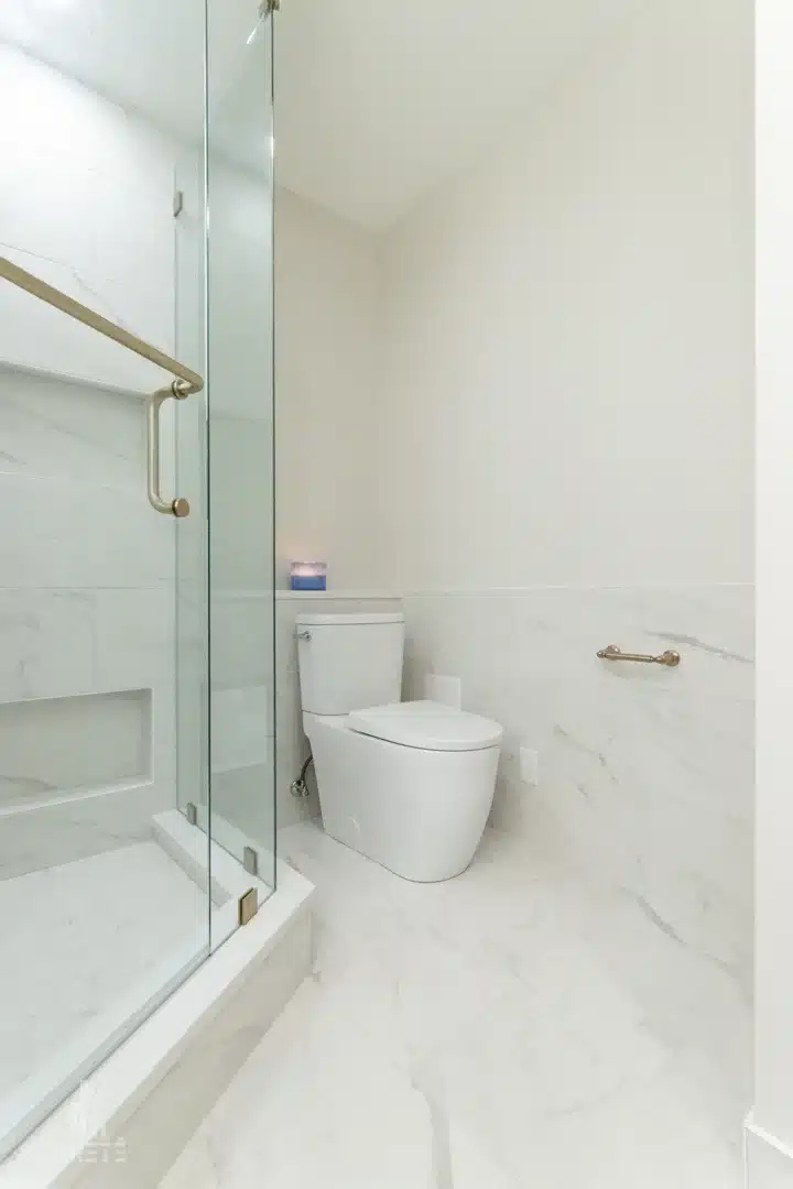 monochromatic bathroom with matching trim and walls